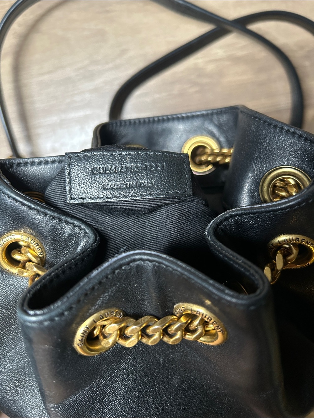 Saint Laurent Black Leather Drawstring Backpack with Gold Hardware - Picture 2 of 11
